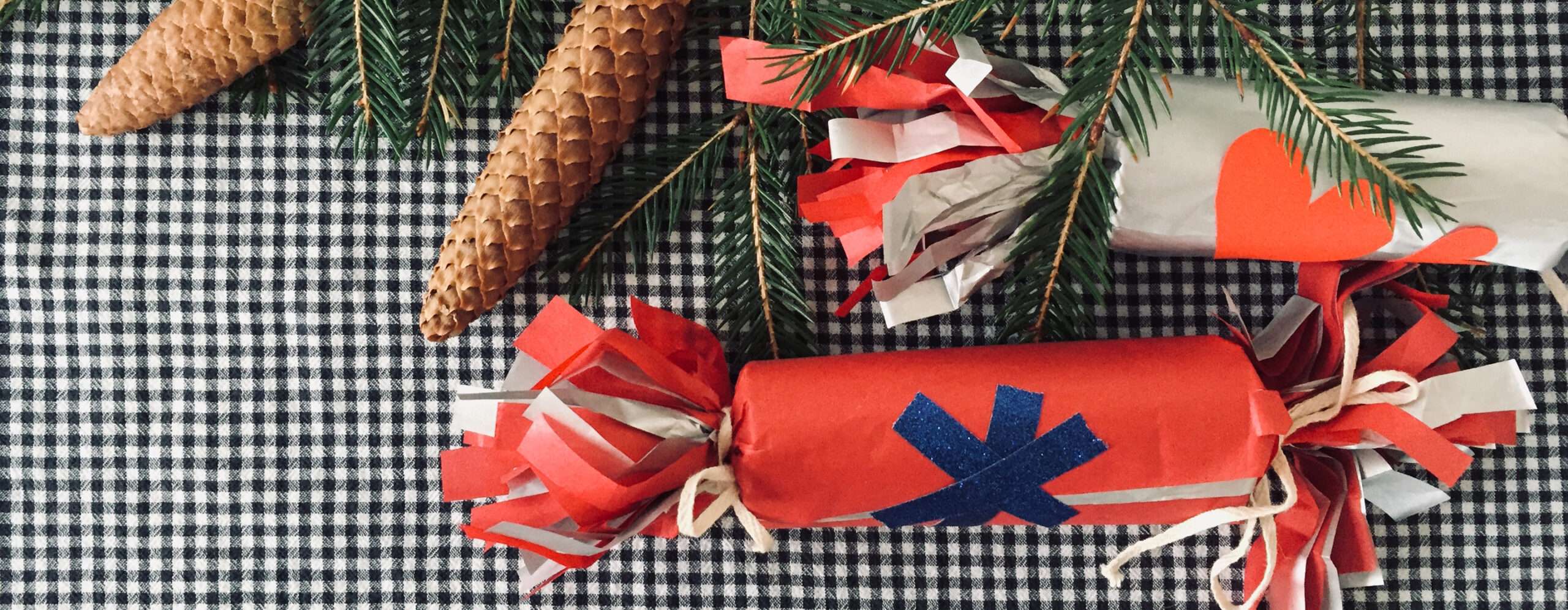Aerial view of spruce branches and cones and homemade julgranskarameller